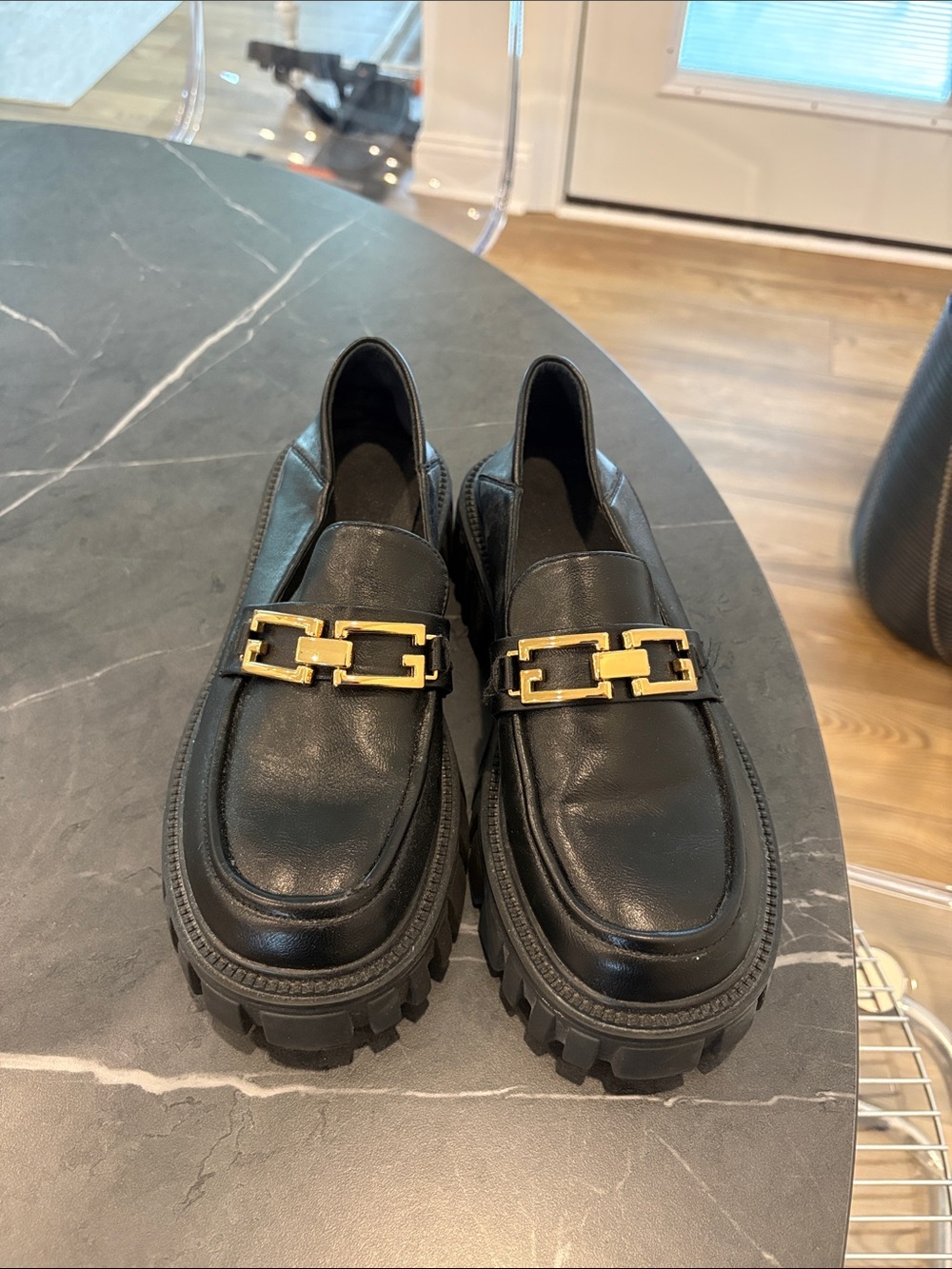 Black Leather Lug-Soled Loafers with Gold Chain Accent - Picture 1 of 5